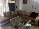 7 seater sofa and Table 15,000