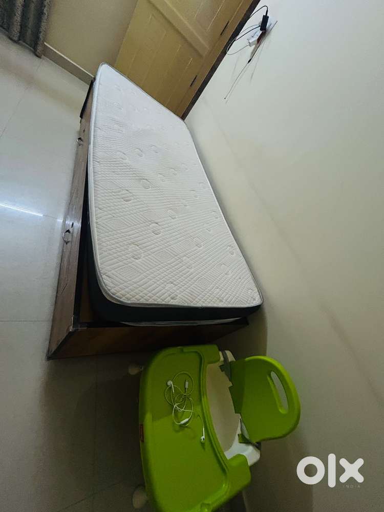 Single bed with storage including mattress
