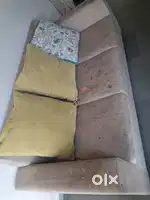 Good condition 3 + 1 seater sofa + 4 large cushions with covers