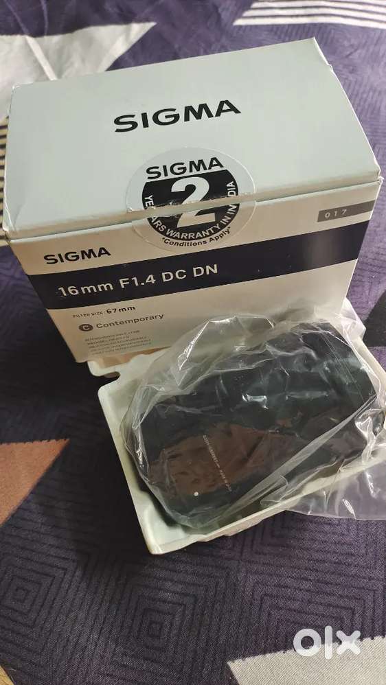 Sigma 16mm lens for sony E Mount' only 2 days used with bill and box