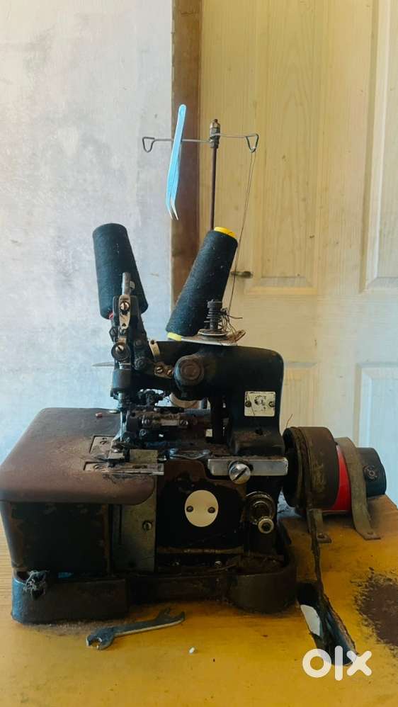 Overlock tailor machine
