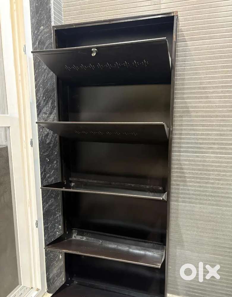Five shelf brown shoe rack (in good condition)