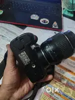 Nikon D3100 Dslr Camera With An 18 55Mm Af S Dx Nikkor Vr