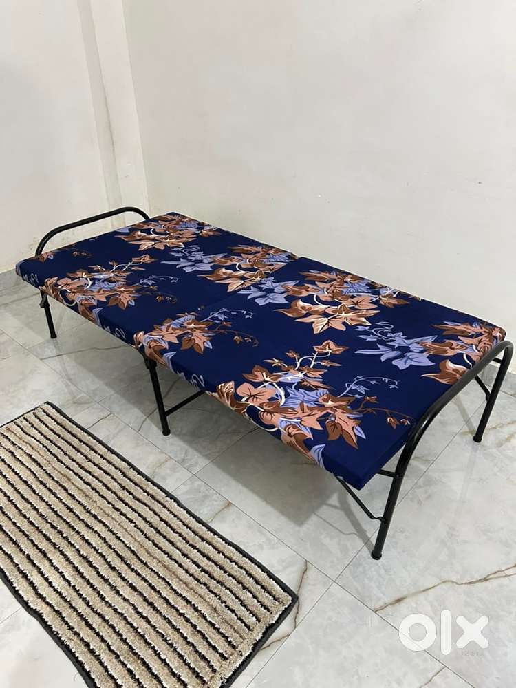 Single bed with attached mattress for 3500/-