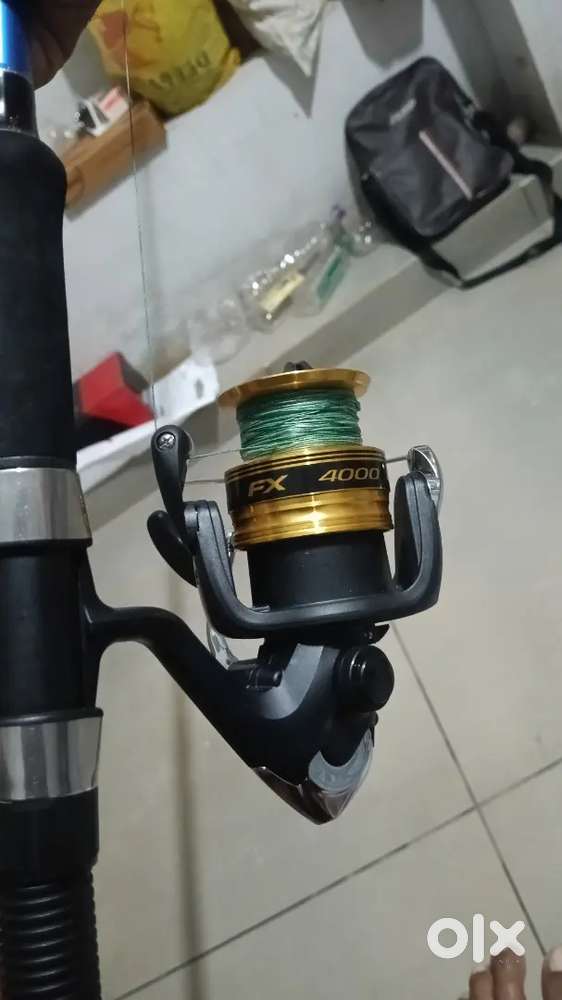 Shimano fx 4000 reel and mag horizon 7 feet road 100%no damage  fresh