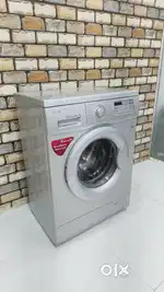 Lg silver colour 6kg direct drive front load fully automatic Machine .