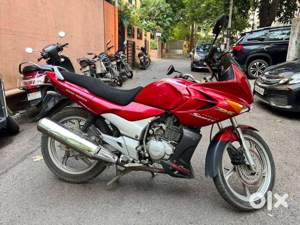 Single owner genuine condition Karizma Red 125CC