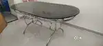 Glass top steel dining table-6 seater-Maintained in good condition