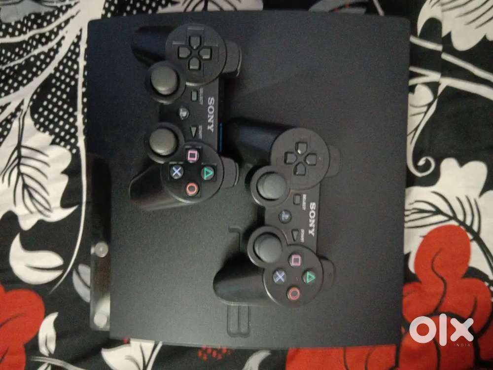 Play station 3 brand new condition with two controllers and 28 games.