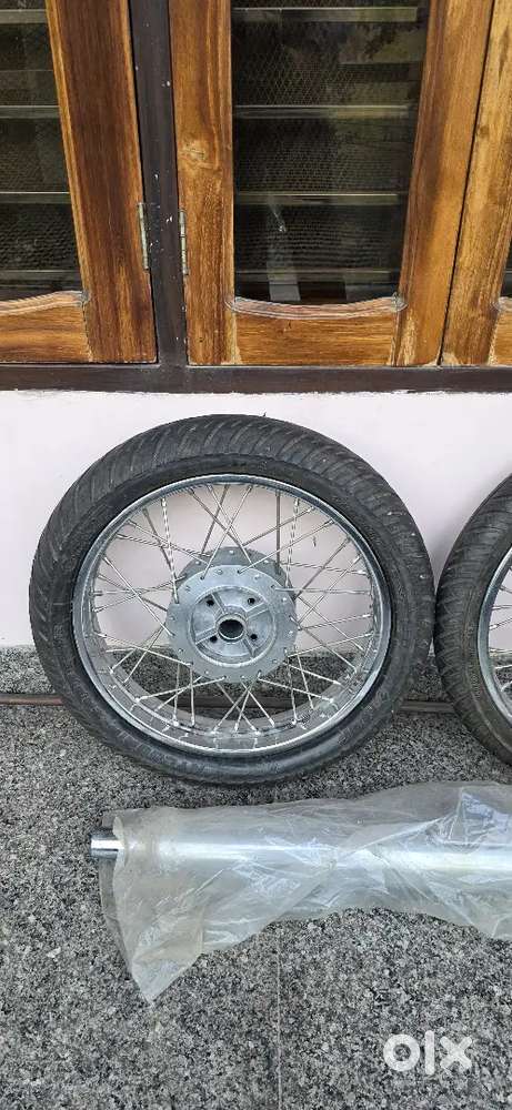 Original wheel and Silencer of Royal Enfield Classic 500