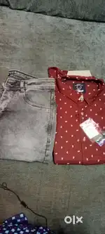 White and black jeans and red full shirt