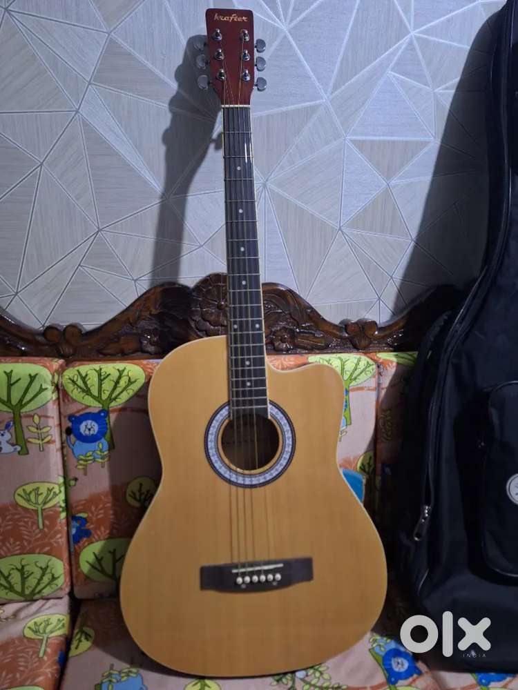 KRAFTER company imported fully accoustic rosewood guitar