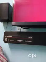 LG Home theatre with SOUND BAR MODEL SNC4R wireless just 4 month old