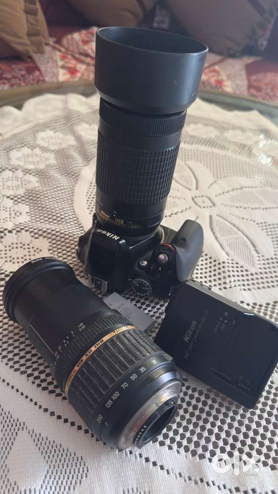 Nikon D3300 with 70-300mm lens or 18-200 tamron lens
