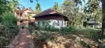 Land for sale near Dharmadom.