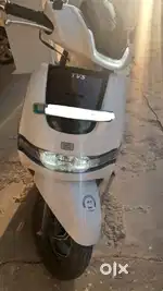 Less Driven Well maintained TVS IQUBE 2022 Model White Single Owner