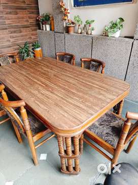 Teak dining  tbl with 6 chairs in good condition