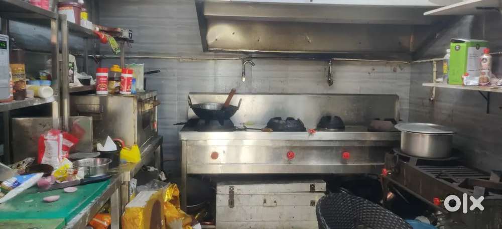 Cloud kitchen for sale with complete equipment surrounded by IT compan