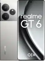 Realme GT 6. 16gb Ram 512 with 6 months one assist insurance