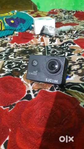 SJ CAM 4000 camera and  waterproof showcase only