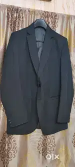 Classic black blazer, perfect for any occasion. Versatile and stylish