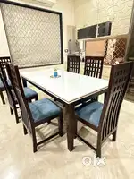Marble top 6 seater dining table