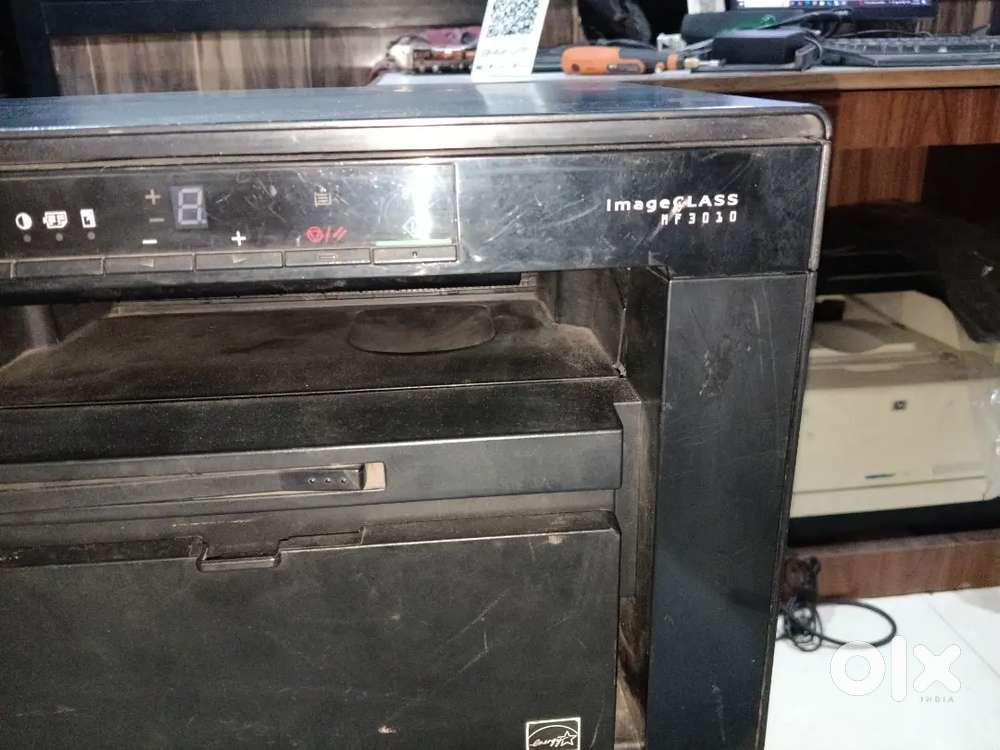 Canon laser printer sell with scanner and new refling