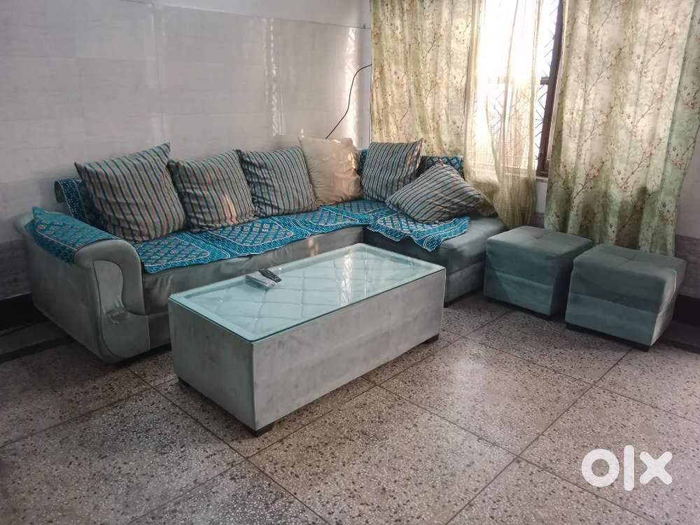 L share 7 seater sofa and window AC