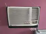 Carrier window ac with stabilizer