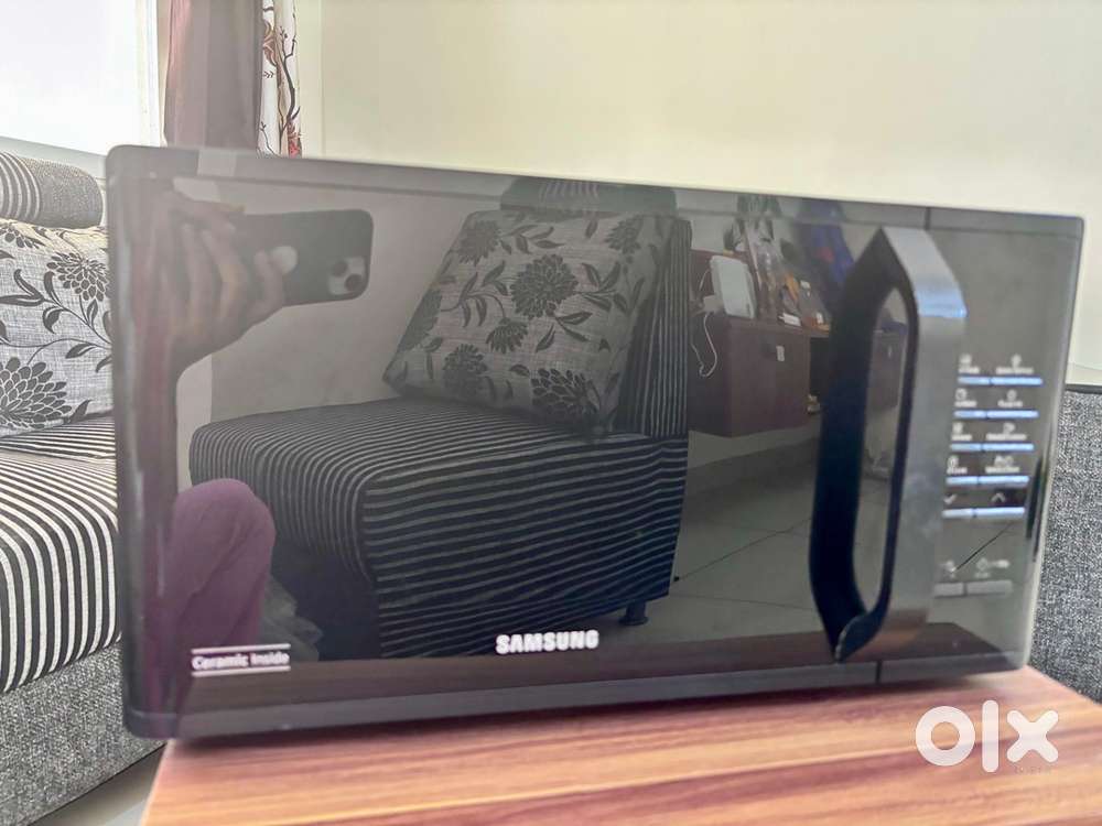 Samsung MS23K3513AK/TL microwave.