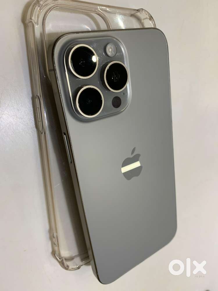 I phone 15 pro max ,256gb natural titanium original charger and box