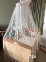 Rocking and rolling cradle