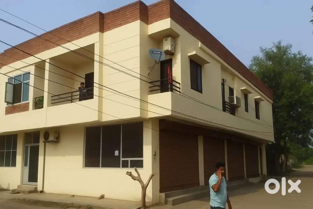 200 Sqft corner shop. Opening on 40 ft entry Road