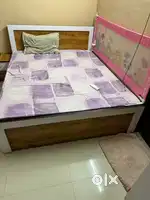 New Bed along with mattress and side table
