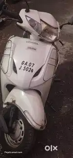 PS white Honda Activa in mint condition.