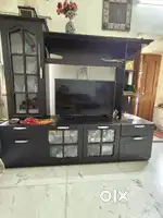 Manderin wood TV cabinet with closed and open spaces