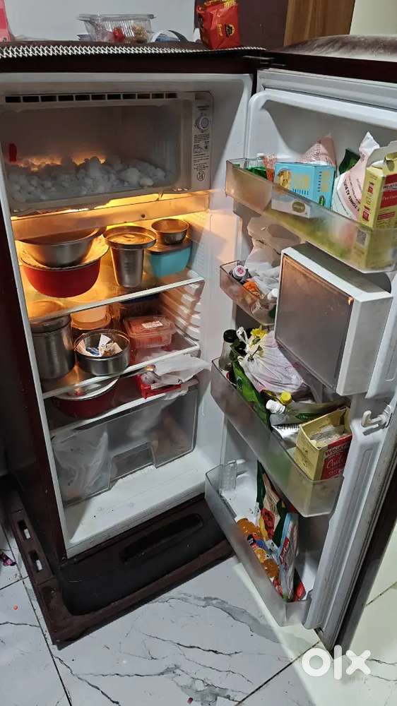 Bed, refrigerator and rocking chair
