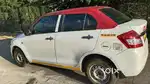 Red taxi driver wanted with badge