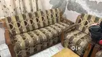 5 seater sofa set and a table