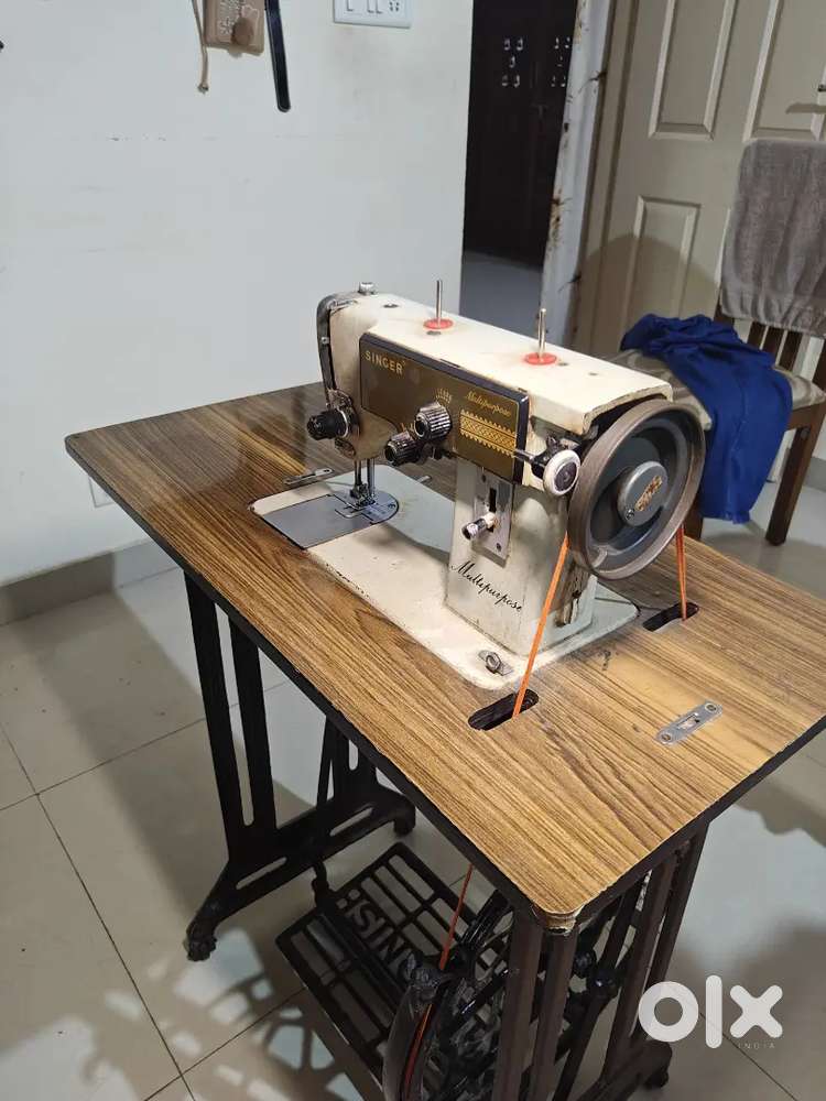 Singer Sewing Machine with Table - Excellent Condition - Negotiable