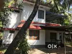 House near Dharmasala Highway, Kannur