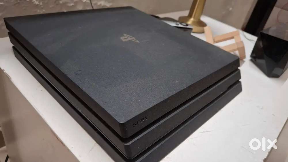 Ps4 pro 1tb with 2 controllers and 6 games