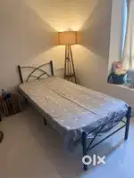 Single bed with mattress, study table with chair, cloth rack