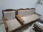 5 seater Pure Sheesham Wooden sofa for sell with new customised cover
