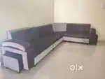 Dual tone L shape 7 seater sofa with two wheeled stool for sale!