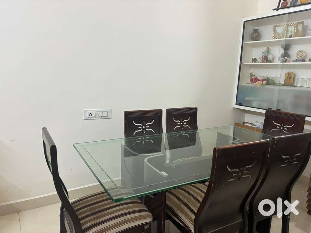 6 seater Glass Dinning Table with chairs