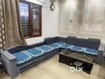 L shape sofa with center table with space