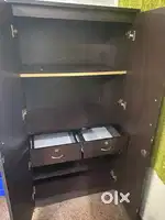 Spacious Cupboard with multiple compartments and drawers for daily use