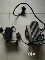One sewing machine motor.one three burner automatic gas stove.