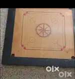 Tournament carrom board